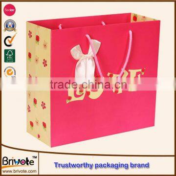 2016 china paper shop bag/clothes boutique paper shopping bag/cheap small paper gift bags with handles