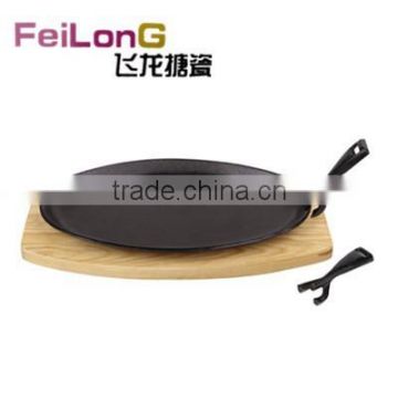 cast iron steak plate with wood