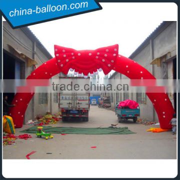 Inflatable bowknot arch door / red color inflatable wedding arch for sale