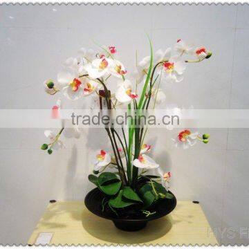 Decorative potted white orchid flower - artificial arrangement