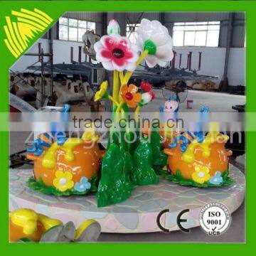 Funny! Flower and bee cup amusement ride for kids