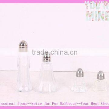 Clear glass salt and pepper shaker with metal cap