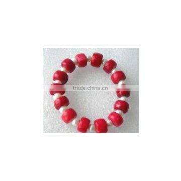 wholesale 7" pearls & 8-13mm china red drum shaped natural coral bracelet