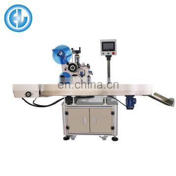 Автоматическая машина для нанесения этикеток на одежные бирки photo-4