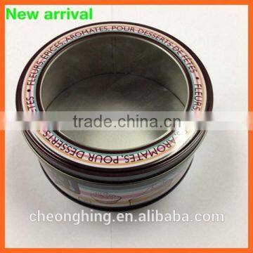 Round tin box with window