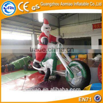 inflatable santa with car, inflatable santa on motorcycle