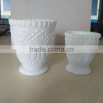 white cup shape candle jar