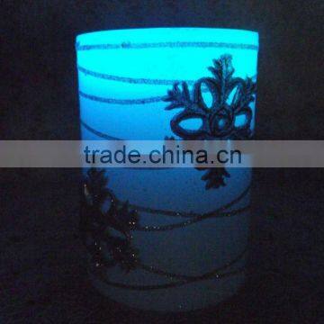 Battery operated LED wax colorful candle with snow