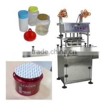 Automatic 2-head plastic jar heat sealing machine with conveyor belt