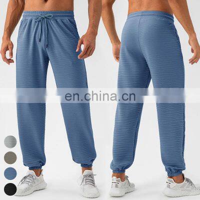High Quality Breathable Quick Dry Cool Feeling Running Fitness Joggers Drawstring Bunched Casual Loose Trousers Men Jogger Pants