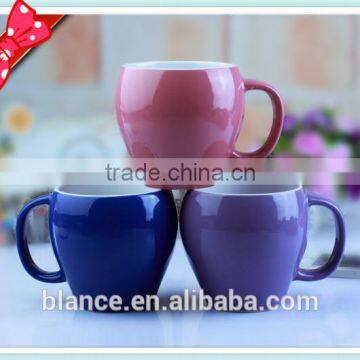 ceramic coffee mug in apple shape