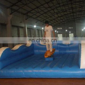 Exercise surfboard simulator rides inflatable game