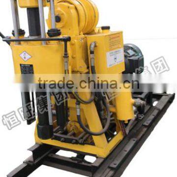 Water Well Drilling Rig Working With Air Compressor