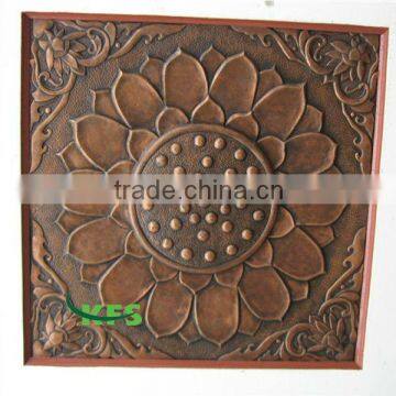 Metal flower relief sculpture