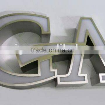 Frontlit acylic channel letter with stainless steel border