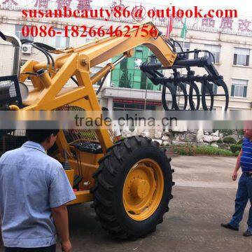 Small wheel loader with sugarcane grasper