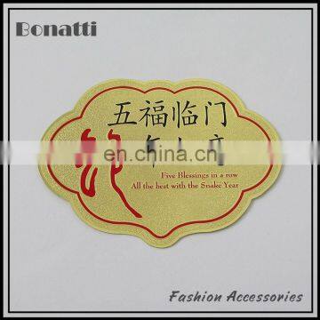 golden custom metal brand logo label
