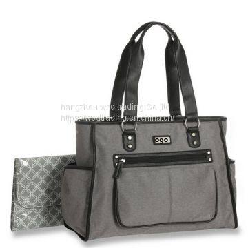 Grey fabric diaper bag with pockets and bottle bag