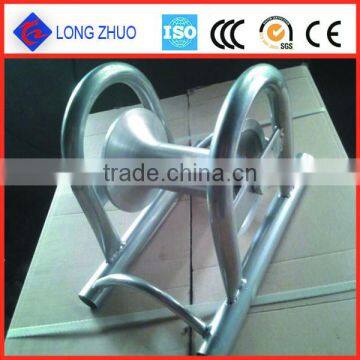 Ground cable roller, cable block