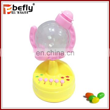 Plastic earth globe candy filled toy with light and music