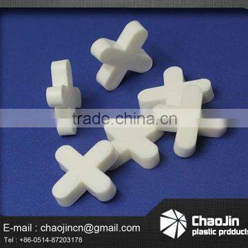 border white cross spacer