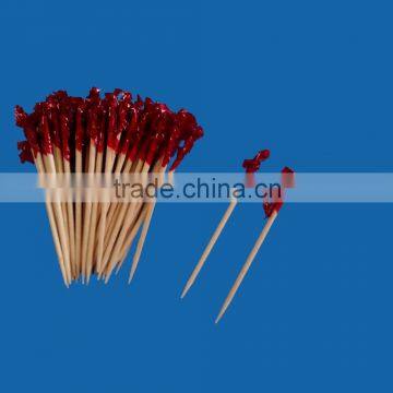 red frill cocktail toothpicks in can