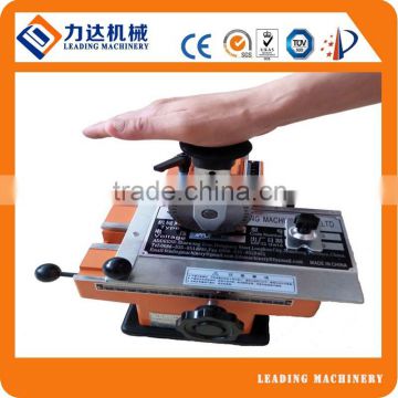 Metal plate pressing machine