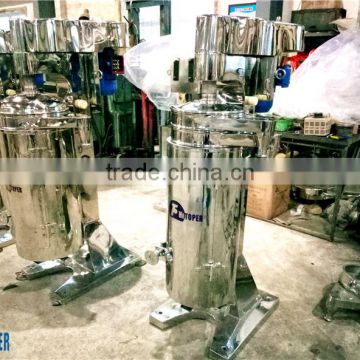 Tubular bowl centrifuge used for oil water separation in coconut oil mill