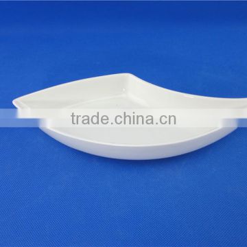 white porcelain peacock fruit dish