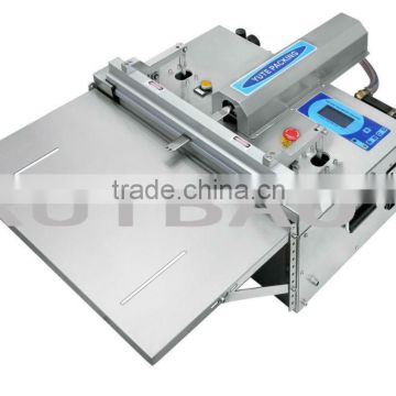 Outside pumping vacuum packaging machine