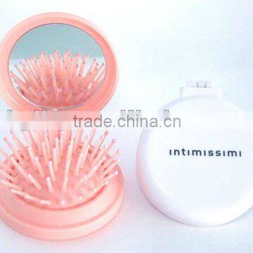 plastic mirror comb