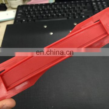 Red plastic handle for carton packing