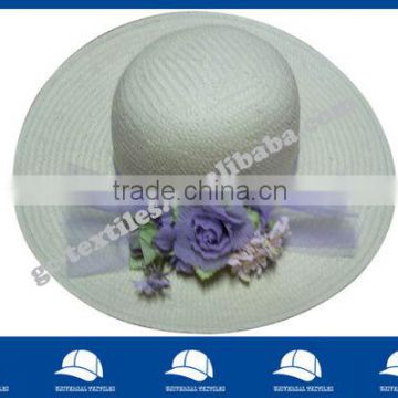 lady straw hat with purple flower