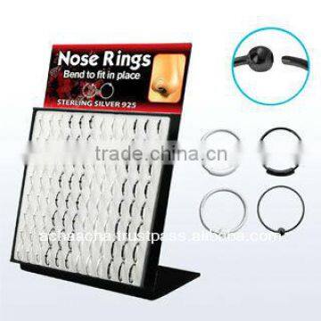 Display board with 96 pcs. of sterling silver nose hoops with and without ball