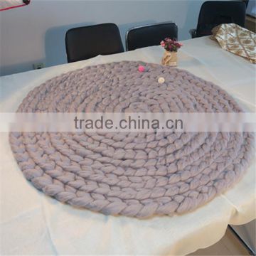 Hand made round chunky knit wool rug