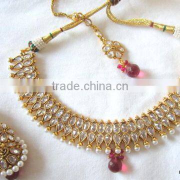 Gold plated polki Designer necklace Earring tika set