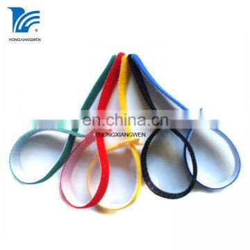 Colorful durable hook and loop pad attachment