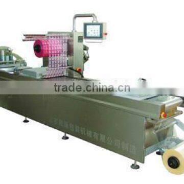 Snack automatic thermoforming vacuum packing machine