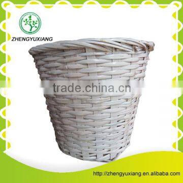 White round bamboo plant basket with inner bag