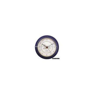Art. 2518BLU Quartz clock set into brass marine case