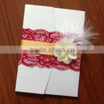 pocketfold wedding invitation cards with feather and flowers