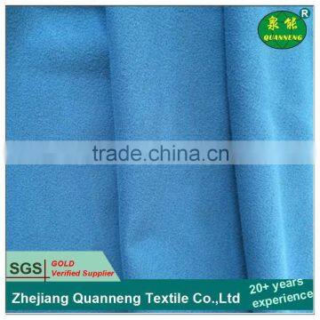 Solid color polyester knitted uniform fabric