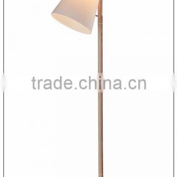 modern floor mounted light in natural wood base with off-white fabric shade