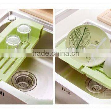 handing kitchen sink fruit vegetable plastic drain basket