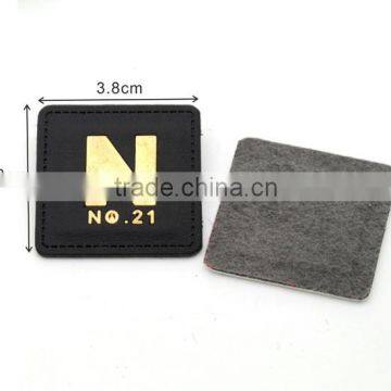 White/black PU leather sew on patches with Gold metal plates fashion clothing label for jeans/jacket PLB-022