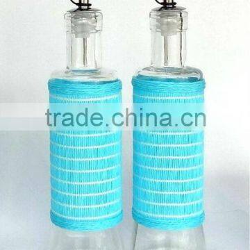 TW675SB2 round glass oil bottle with weaved coating