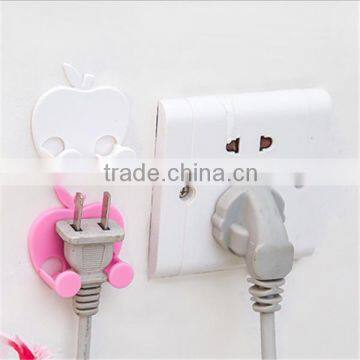 Wall plug holder,plug hanger