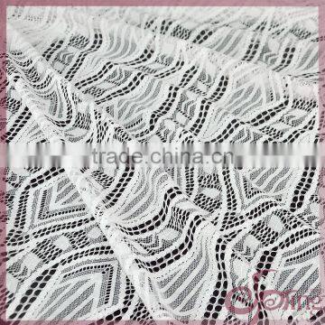 Geometric design fancy latest lace fabrics wholesale for dress