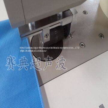 Outlet ultrasonic non woven surgical gown sealing machine