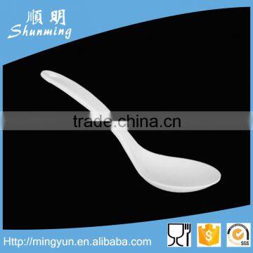 White plastic melamine serving spoon for soup